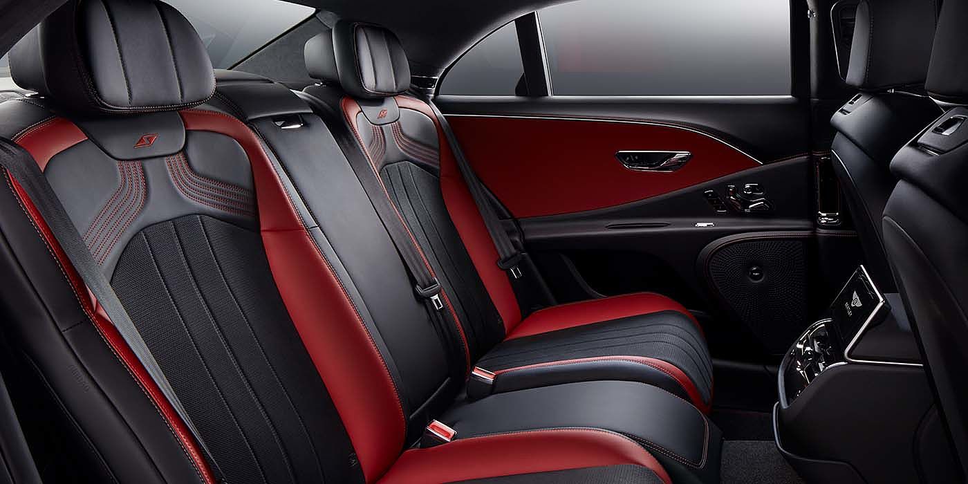 Bentley Barcelona Bentley Flying Spur S sedan rear interior in Beluga black and Hotspur red hide with S stitching