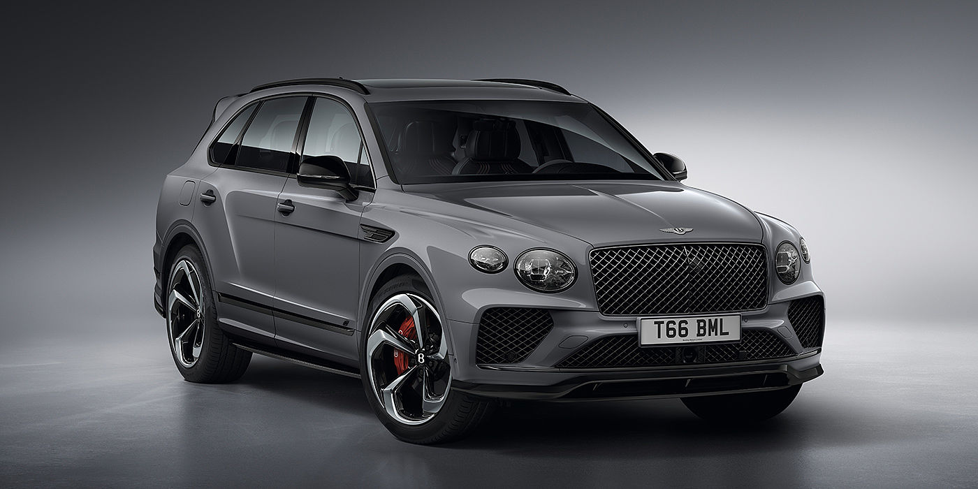 Bentley Barcelona Bentley Bentayga S in Cambrian Grey paint front three - quarter view with dark chrome matrix grille and featuring elliptical LED matrix headlights. 