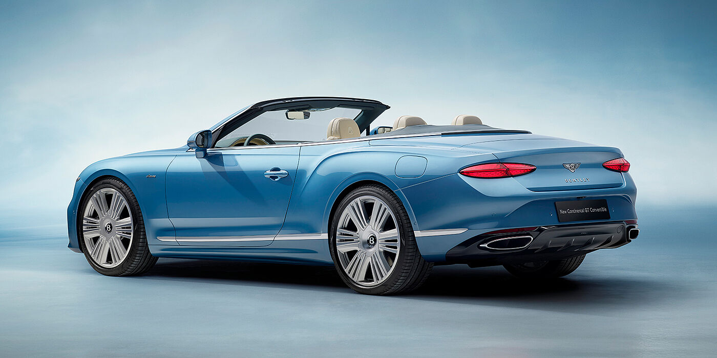 Bentley Barcelona New Bentley Continental GTC Azure convertible rear view in Light Windsor blue paint with 22 inch ten spoke wheels and chrome exterior details