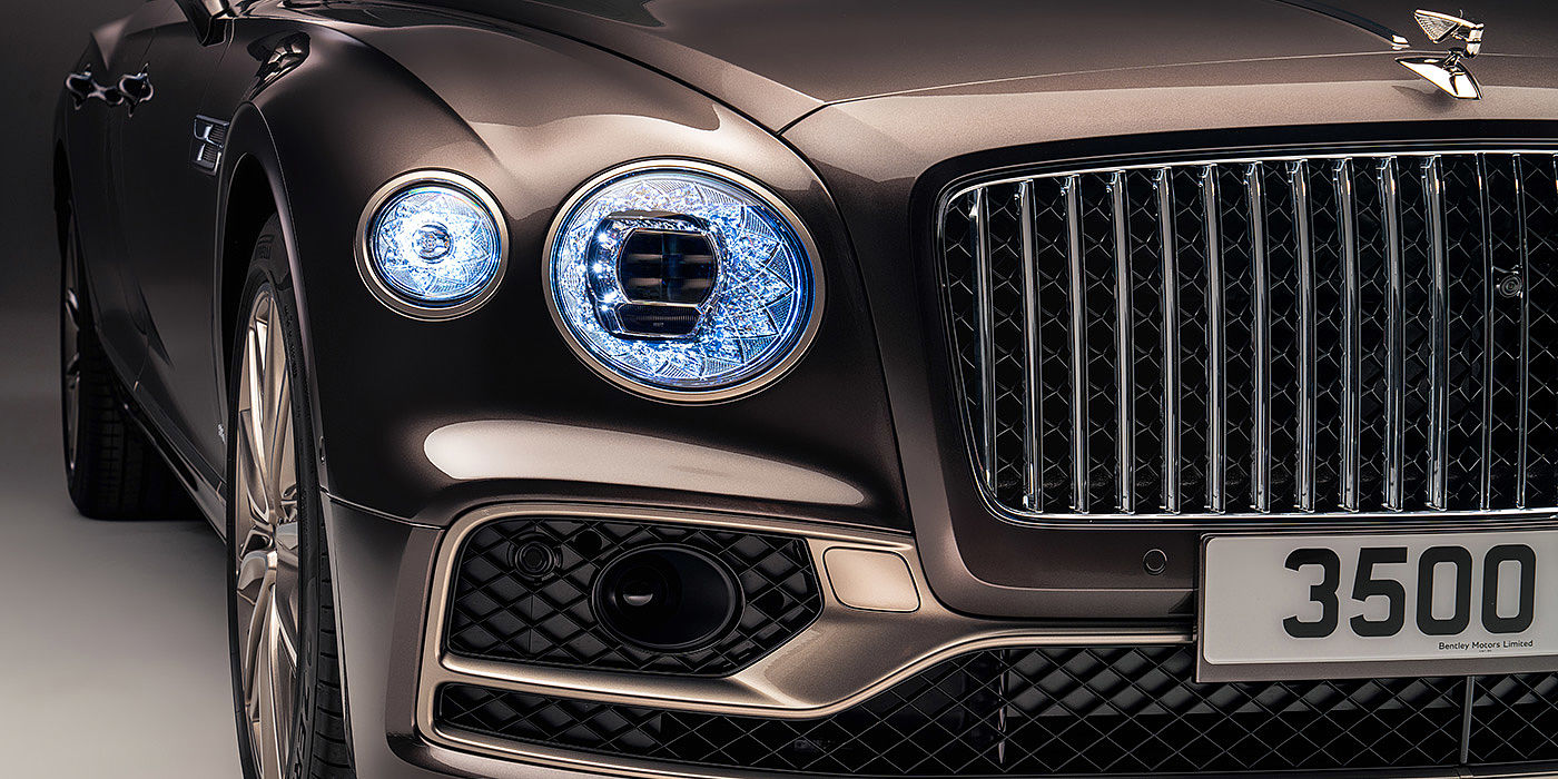 Bentley Barcelona Bentley Flying Spur Odyssean sedan front grille and illuminated led lamps with Brodgar brown paint