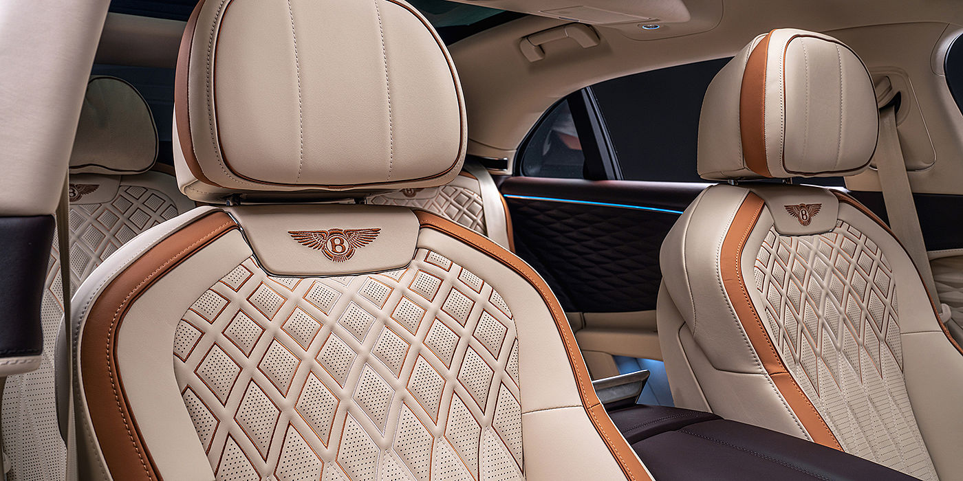 Bentley Barcelona Bentley Flying Spur Odyssean sedan rear seat detail with Diamond quilting and Linen and Burnt Oak hides