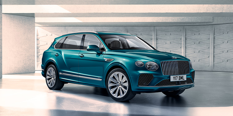 Bentley Barcelona Bentley Bentayga Extended Wheelbase Azure SUV front three quarter in Topaz blue paint colour with a grey background