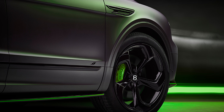 Bentley Barcelona Bentley Bentayga S Black Edition SUV exterior wheel detail with Cyber Green brakes with Anthracite Satin paint